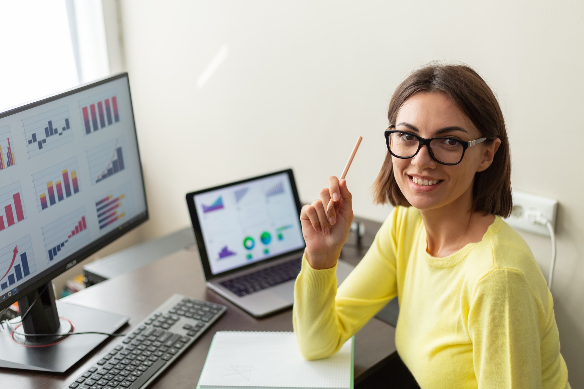 Caucasian advisor financial business analytics woman with data dashboard graphs